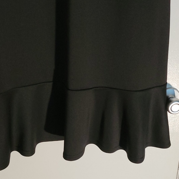 Black zippered mock neck dress with ruffle on hem - Picture 6 of 6
